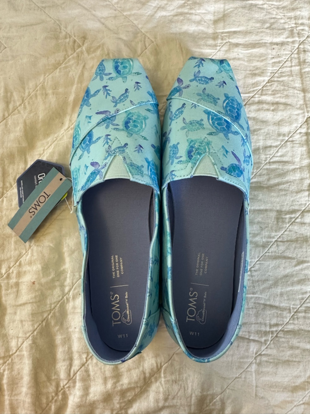 TOMS Women's Sea Turtle Print Canvas Slip-Ons in Aqua and Teal